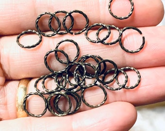 100 pcs of antiqued brass color fancy  jump rings 8mm round  20 gauge