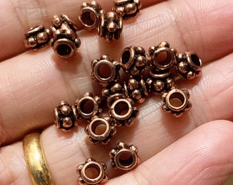 A granel 300 piezas espaciador de rondelle de flor de cobre antiguo 6x4 mm