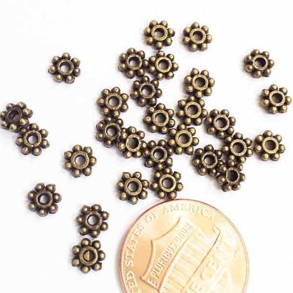 100 pcs  antique bronze  flower spacer Daisy spacer 4mm, bulk flower beads