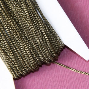 32ft spool  antiqued brass tiny curb chain - 1.3mm - Soldered links