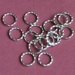 100 pcs of Antiqued silver plated fancy jumpring 9mm round 16 gauge