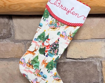 May include: A white fabric Christmas stocking featuring a repeating pattern of Santa Claus, reindeer, Christmas trees, and gift boxes. The cuff is white with red trim and the embroidered name Braylen in red script, finished with a red hanging loop.