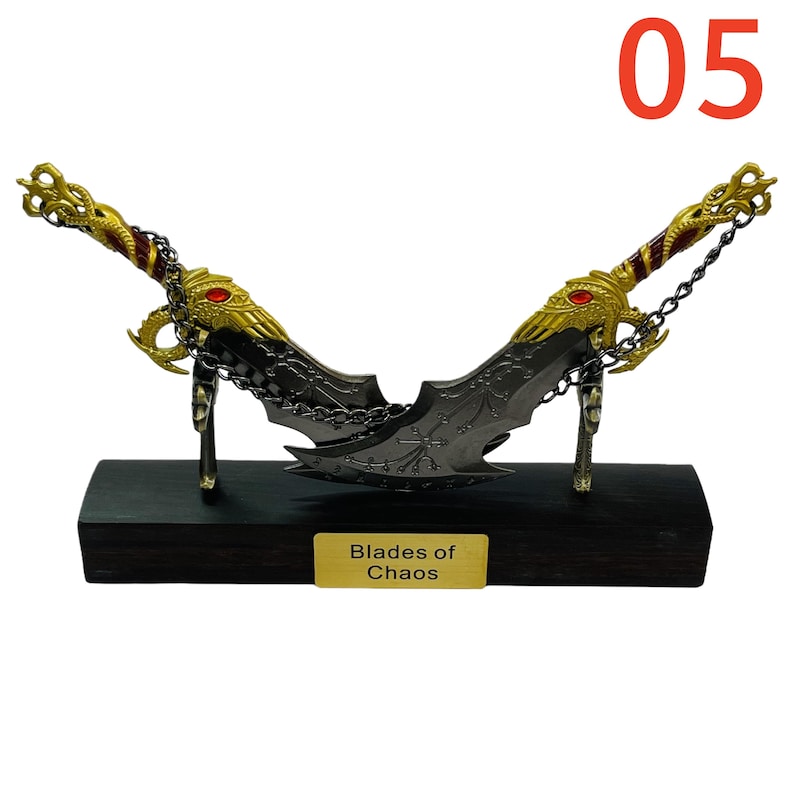 May include: A pair of decorative blades with ornate gold dragon-themed handles and a dark gray blade. The blades are connected by a chain and displayed on a black wooden base with the text "Blades of Chaos" on a gold plate. The number "05" is in the top right corner.