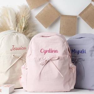 Sac à dos de ballet rose personnalisé - Joli cartable de danse avec noeuds pour tout-petit - Cours de danse parfait et cadeau de remise des diplômes - Sac à dos pour enfant avec nom personnalisé
