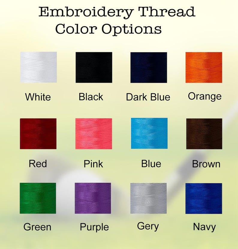 Puede incluir: Una tabla que muestra las opciones de color de hilo para bordar. Los colores son blanco, negro, azul oscuro, naranja, rojo, rosa, azul, marr&oacute;n, verde, morado, gris y azul marino.