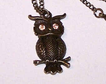 bronze owl necklace with yellow rhinestone eyes