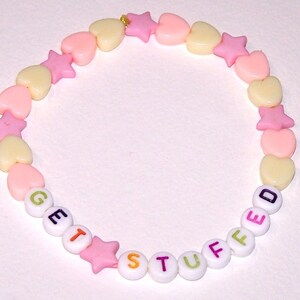 pink orange and yellow GET STUFFED bracelet