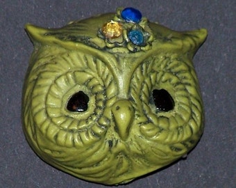 big green owl head magnet