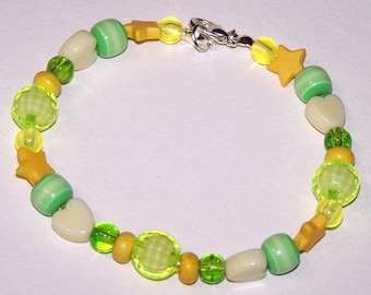 green and yellow springtime bracelet with stars and hearts