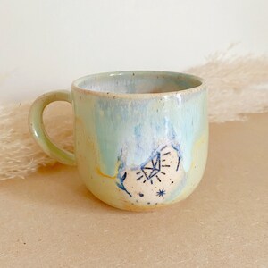 Handmade Ceramic Green Mystic Mug with speckled clay, witchy mug for crystal lovers