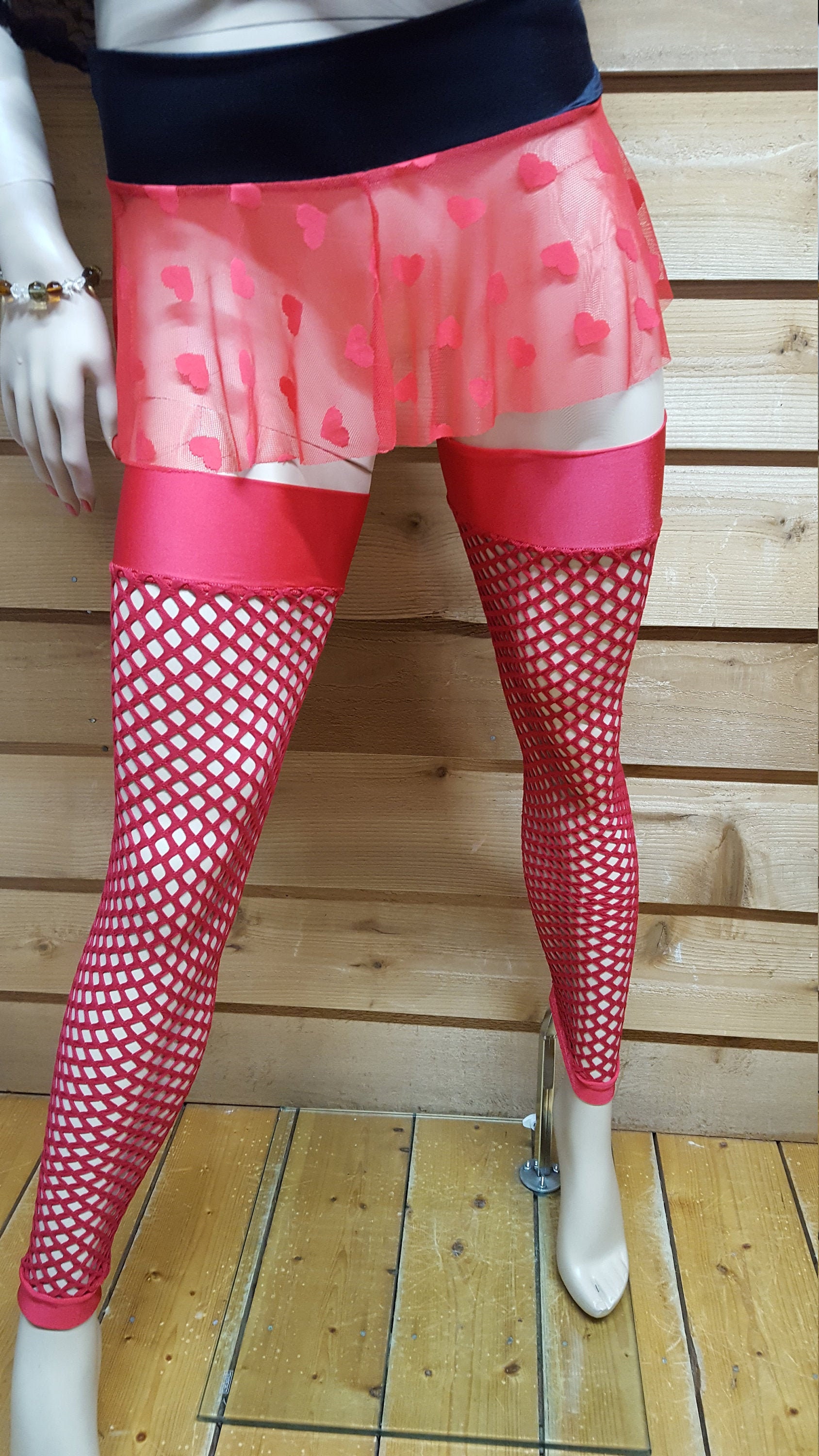 Red thigh high fishnet leggings