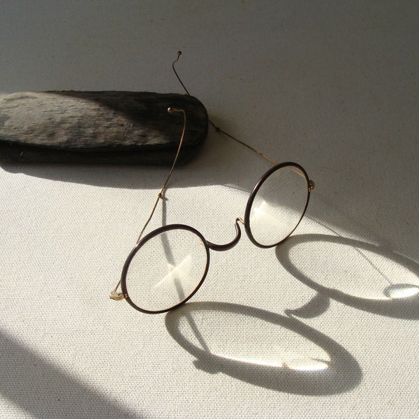 vintage gold spectacles or eyeglasses with case