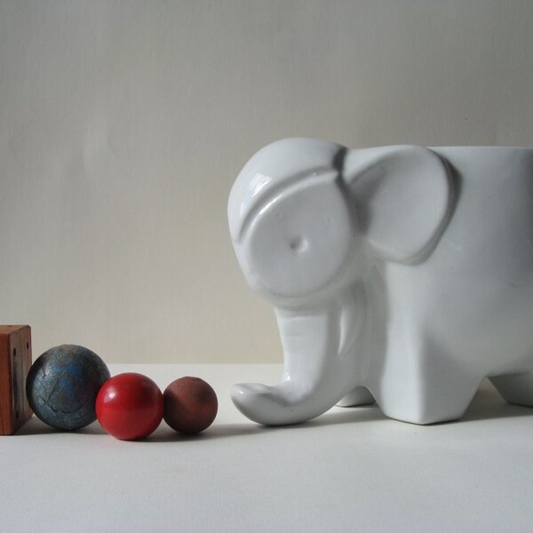 white ceramic elephant planter or vase or holder of tiny things