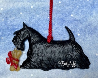 Scottish Terrier w/bone charm. Black. Christmas/holiday artist quality dog breed ornament.