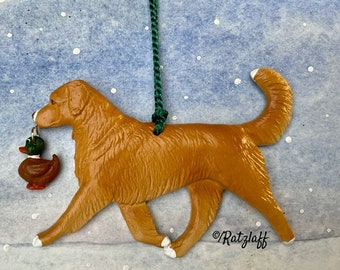 Nova Scotia Duck Tolling Retriever with toy duck. Christmas/holiday handcrafted dog breed ornament.
