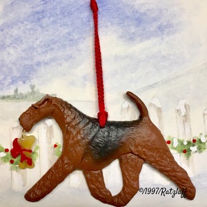 Airedale Terrier with bone charm-Christmas/holiday handcrafted dog breed ornament.