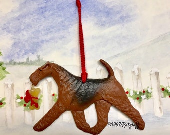 Airedale Terrier with bone charm-Christmas/holiday handcrafted dog breed ornament.