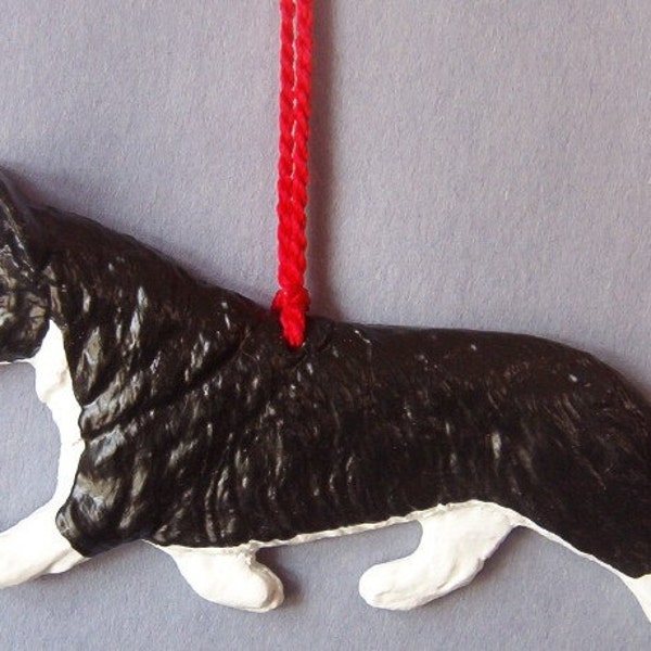 Corgi with sheep. Cardigan-black and white artist ornament.