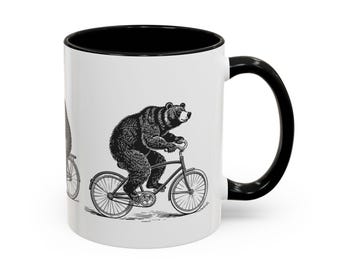 Vintage Bear on Bicycle Mug | Cycling Animal Art Coffee Cup | Quirky Black and White Gift UK, Accent Coffee Mug (11oz) Different Colours