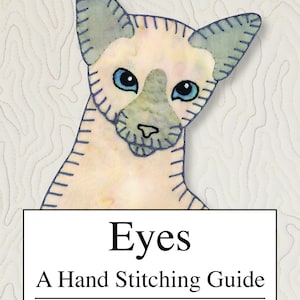 Könnte beinhalten: Ein Buchcover mit dem Titel "Eyes: A Hand Stitching Guide" von Darcy Ashton. Das Cover zeigt eine Nahaufnahme einer handgenähten Eule und eine Siamkatze, die über den Rand schaut.