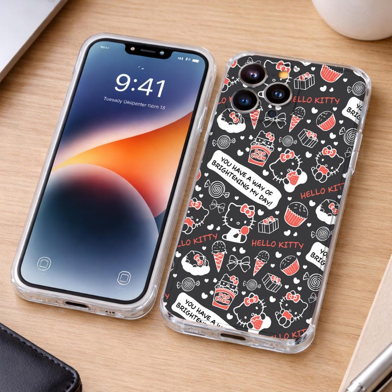 May include: Two clear phone cases, one with a screen displaying the time and date, the other with a black background and a pattern of Hello Kitty characters, ice cream cones, and cupcakes. Text on the case reads "You have a way of brightening my day!"