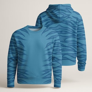 May include: A light blue sweatshirt and hoodie set. Both garments feature a pattern of dark blue stripes and small white dots. The hoodie is shown from the back, displaying the striped pattern on the hood and back. The sweatshirt is shown from the front.