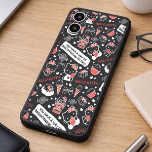 May include: Black phone case featuring a repeating pattern of Hello Kitty characters, sweets, and bows in red and white. The case includes the text "You have a way of brightening my day!" and "Hello Kitty".