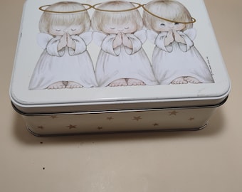 Precious moments tin