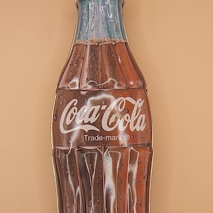 Coke bottle tin