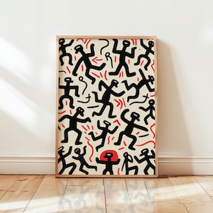 May include: A framed art print with a repeating pattern of black stick figures in different poses, with red lines and shapes on a cream background. The artwork is in a wooden frame and is displayed against a white wall.