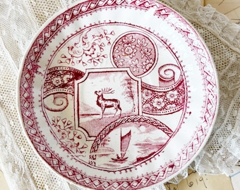 Piattino antico in ceramica decorata con tecnica transferware