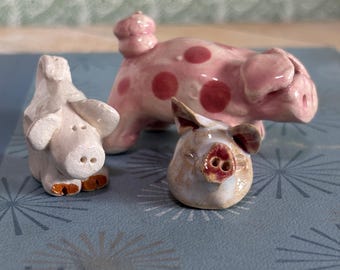 3 cerditos de arcilla