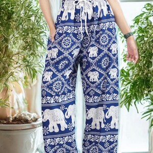 May include: Blue and white patterned pants with an elephant motif. The pants have a drawstring waist and a wide-leg design. The elephant pattern is repeated throughout the pants, creating a cohesive and eye-catching look. The pants are made of a lightweight fabric.