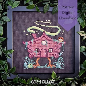 May include: A cross-stitch embroidery on dark fabric featuring a pink house with chicken legs, a small owl on the roof, and a glowing green trail above. The text Pattern Digital Download and COSYHOLLOW are visible on the image.