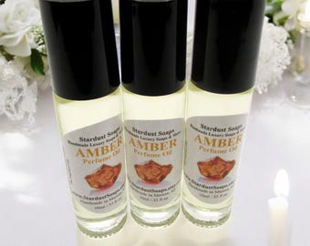 Aceite perfumado roll-on de ámbar exótico hecho a mano: aroma natural y seductor para una elegancia diaria.