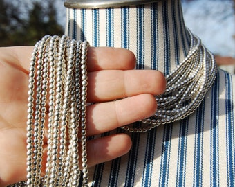 3mm Oval Silver Spacer Beads: Metal Bead Strand (24 Inch)