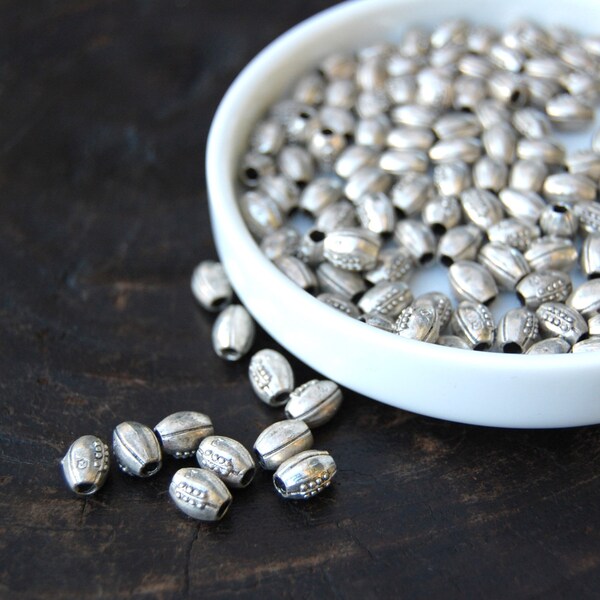 Antique Silver Football  beads, large hole beads, 1 bead, made in the U.S. jewelry making supplies, silver beads, beading supplies