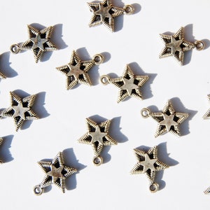 Antique Silver Star charms, Star charms, 1 charm, made in the U.S. jewelry making supplies, silver charms, beading supplies