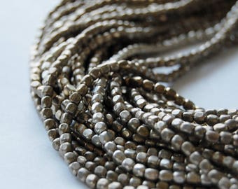 3 mm silver rounded out rectangle metal beads, bead strands, beading supplies, Circle of Stones beads