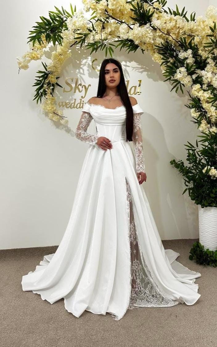 corset wedding dress with long sleeves Lace Up Off Shoulder Wedding Gown, Corset Wedding Dress, Off White Satin Maxi Bridal Gown, Long Sleeve Slit Bridal Dress