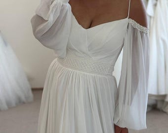 V-Neck Long Sleeve Dress with Dropped Shoulders, Elegant Braided Detail, Flowing Folds, Sophisticated Design