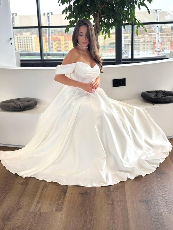 a line princess off the shoulder wedding dress Princess A-Line Pearl Organza Wedding Dress with Off-Shoulder Draped Sleeves, Slit Skirt & Chapel Train