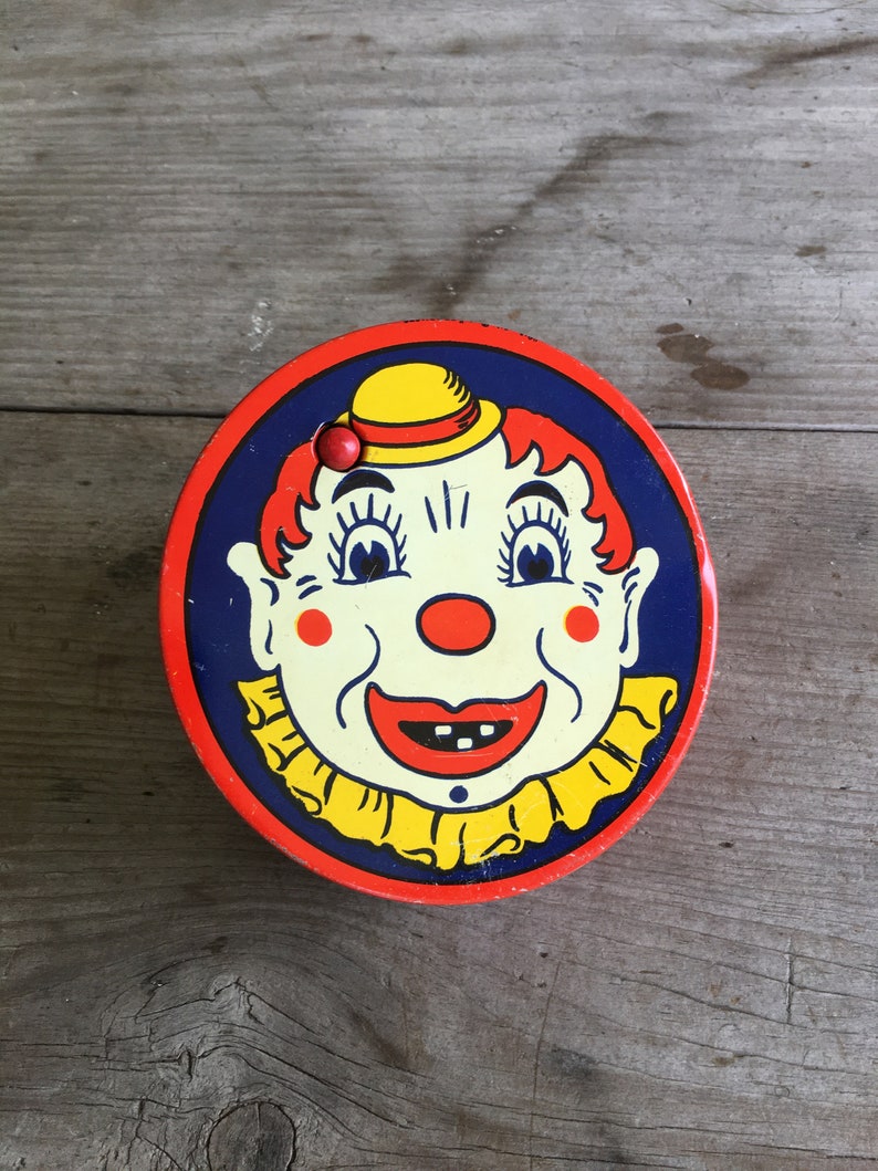 Antique Clown Litho Kirchhof Noise Maker Round Ratchet Style w/ Wooden Handle Ca. 1940s image 1