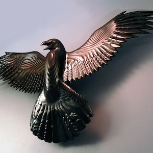 Raven wood carving by Jason Tennant