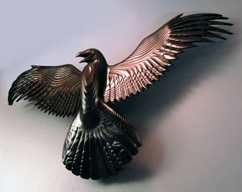 Raven wood carving by Jason Tennant
