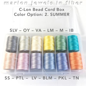 May include: A clear plastic box filled with spools of C-Lon bead cord in various colors. The box is labeled "C-Lon Bead Cord Box" and "Color Option: 2. SUMMER". The spools are labeled with abbreviations for the colors, such as "SLV", "OY", "VA", "LM", "M", "IB", "SS", "PTL", "LV", "BLM", "PKL", and "TN".