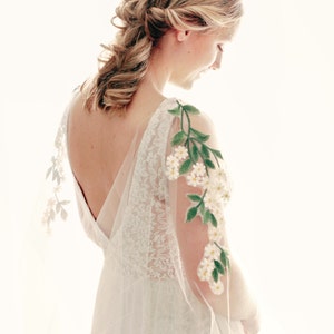 Tulle bridal cape with daisy or leaf appliqué