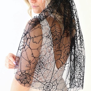 Sparkly spiderweb bridal veil