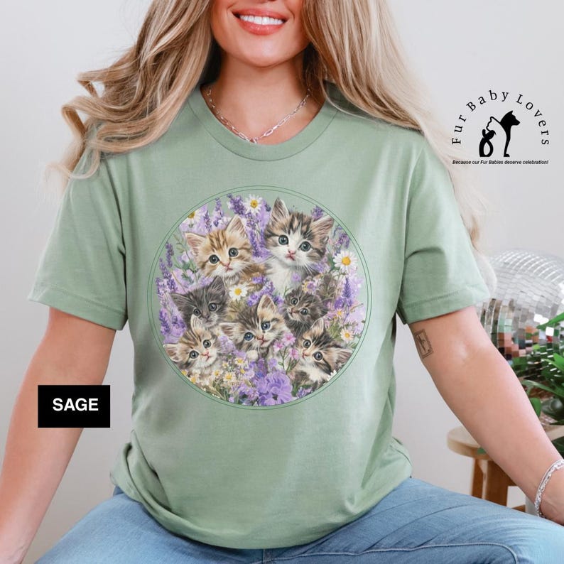 Bella+Canvas 3001 t-shirt with vintage kitten and wildflower design; lightweight, breathable, and perfect for summer cottagecore style. Perfect gift for cozy cottagecore cat lovers,  nostalgic cute floral shirt