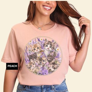 Bella+Canvas 3001 t-shirt with vintage kitten and wildflower design; lightweight, breathable, and perfect for summer cottagecore style. Perfect gift for cozy cottagecore cat lovers,  nostalgic cute floral shirt